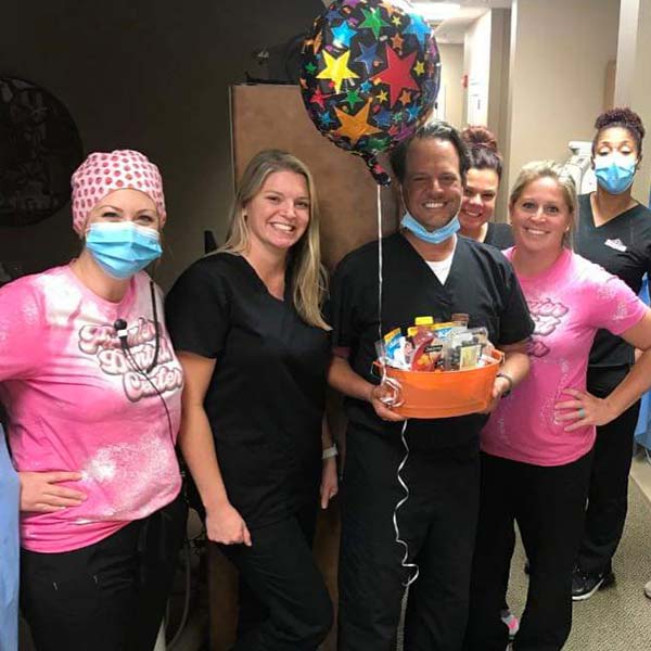 The Premier Dental Center team with goodies