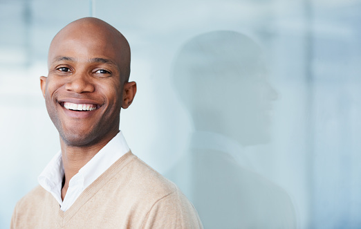 A smiling young man.