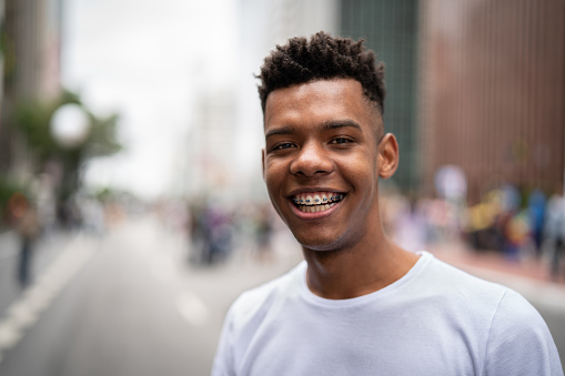 Teen boy smiling with braces